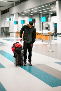 Anxious man in an airport wth fear of flying